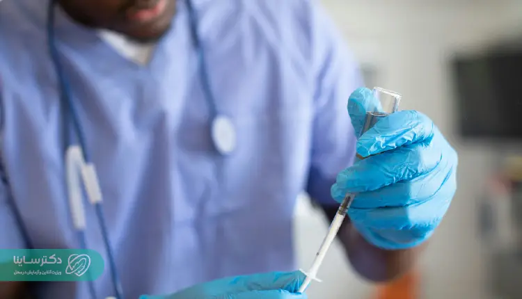 A medical professional preparing a syringe for a blood sample collection, a common step during an MCH test