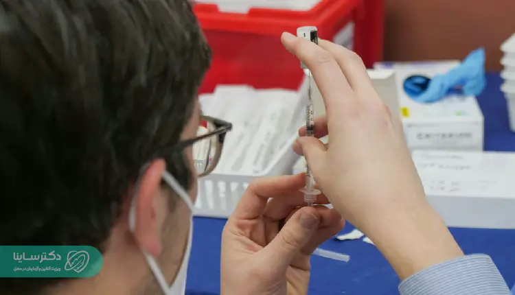 A healthcare professional prepares a syringe in a clinical setting, representing the type of environment where an MCH test may be conducted to evaluate hemoglobin levels in red blood cells