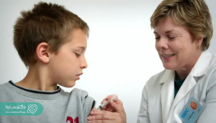 A healthcare professional administering a blood-related injection to a child, possibly as part of an MCH test procedure or anemia screening
