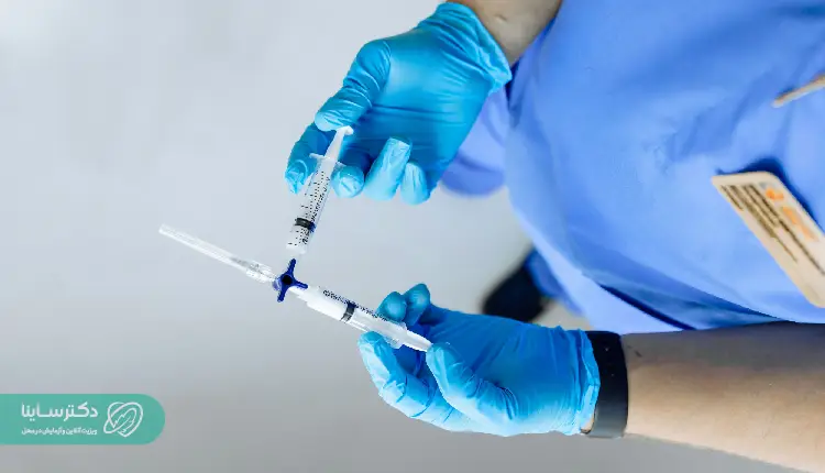 A healthcare professional preparing a syringe for a blood collection procedure, commonly performed during an MCH test