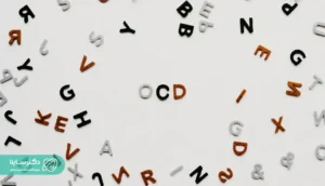 The letters "OCD" surrounded by scattered alphabet letters on a white background, representing the chaos of obsessive thoughts. What is OCD.
